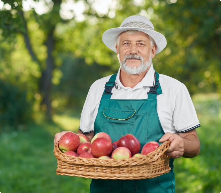 Man Holding an apple